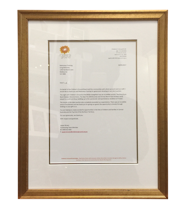 A certificate of appreciation presented to Mahoneys Framing from the Children’s Ground framed in a gold embossed Bellini frame with a double mat board surround.