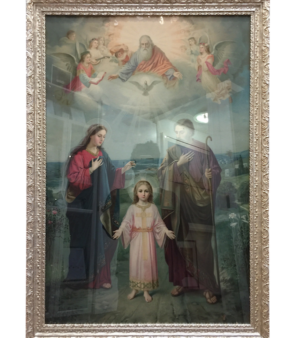 A large religious print framed in a traditional ornate Epoque silver Bellini frame.
