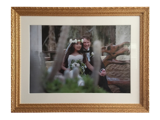 An oversize wedding photo printed by Mahoneys and framed in a double ornate gold leaf frame, part of our exclusive Bellini collection with an extra deep mat board surround and museum glass.
