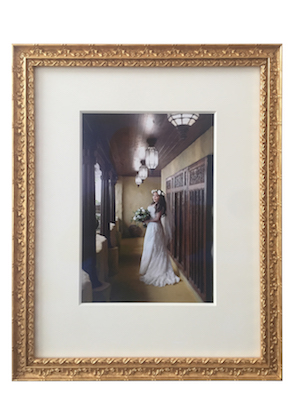 A wedding photo printed by Mahoneys and framed in a gold leaf ornate frame, part of our exclusive Bellini collection with an extra deep mat board surround and museum glass.