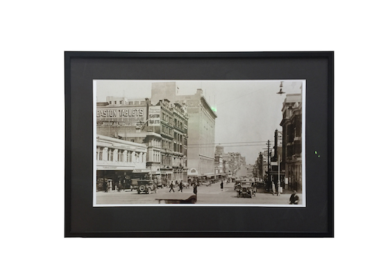 An old Melbourne photograph reframed in a black box frame with a mat board surround.