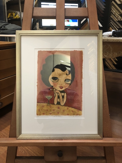 A small watercolour float mounted and framed in a silver frame with mat board surround and UV glass.