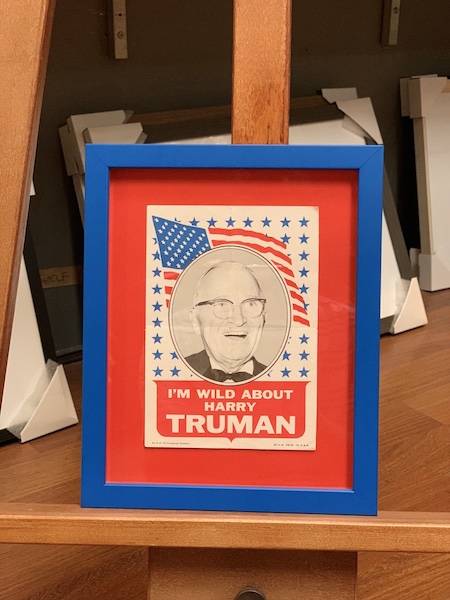 A Harry Truman vintage campaign poster from 1948, floated on red mat board surround and framed in a blue frame with UV glass.
