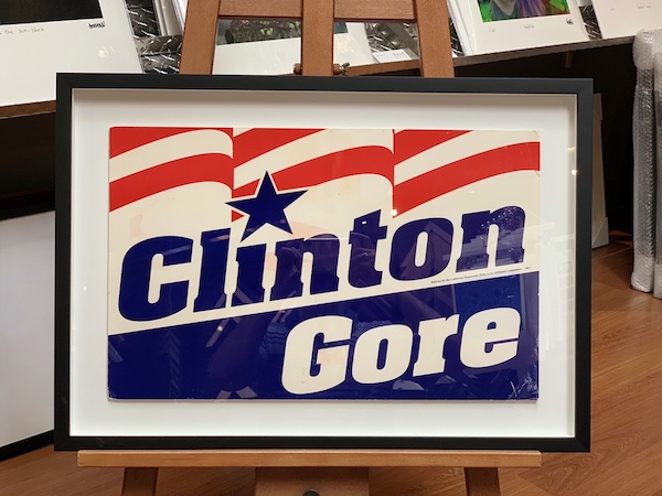 A vintage Clinton/Al Gore campaign poster floated and framed in a black timber frame with a white mat board surround and UV glass.