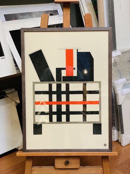 A contemporary abstract print framed in a Tasmanian oak frame with a walnut stain and glass.