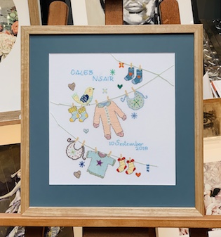 This is a delightful small needlework for a child’s nursery which we have stretched and then framed in a Tasmanian Oak frame with a clear varnish, mat board surround and glass