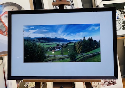 The frame for this delightful landscape photo that has been printed by Mahoneys is a simple black frame, mat board surround and UV glass